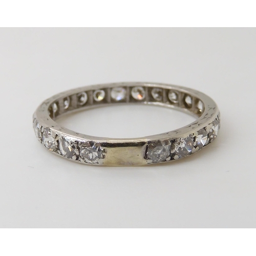 817 - A FULL DIAMOND ETERNITY RINGgrain set in white metal. set with estimated approx 0.88cts of brilliant... 