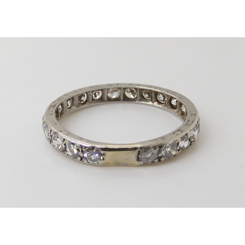 817 - A FULL DIAMOND ETERNITY RINGgrain set in white metal. set with estimated approx 0.88cts of brilliant... 