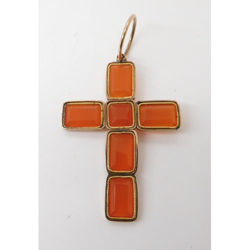 820 - A CARNELIAN CROSSmade from separate facet cut carnelians in vibrant orange mounted in yellow metal. ... 