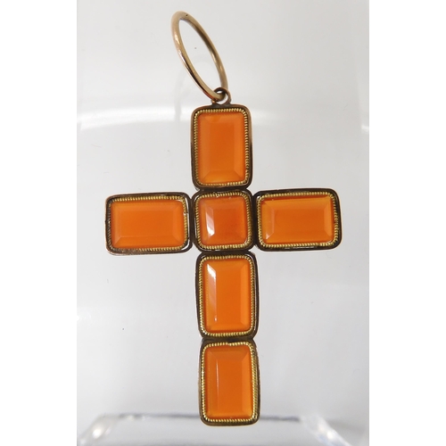 820 - A CARNELIAN CROSSmade from separate facet cut carnelians in vibrant orange mounted in yellow metal. ... 