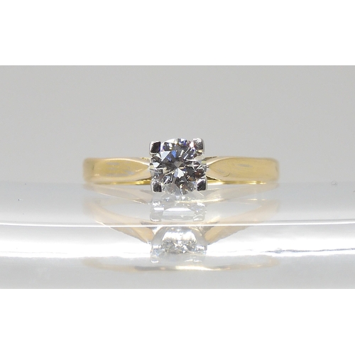 821 - A SOLITAIRE DIAMOND RINGset with an estimated approx 0.48ct brilliant cut diamond in a four claw set... 