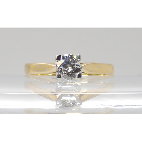 821 - A SOLITAIRE DIAMOND RINGset with an estimated approx 0.48ct brilliant cut diamond in a four claw set... 