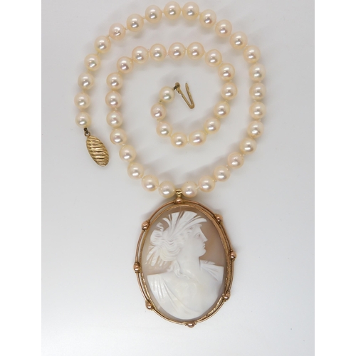 822 - A LARGE 9CT GOLD MOUNTED CAMEO PENDANT & PEARLSthe baroque pearls are approximately 7.4mm each, ... 