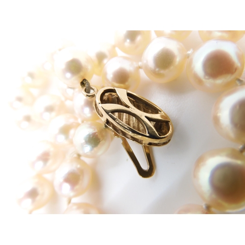 822 - A LARGE 9CT GOLD MOUNTED CAMEO PENDANT & PEARLSthe baroque pearls are approximately 7.4mm each, ... 