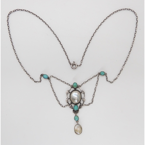 831 - AN ARTS & CRAFTS NECKLACEset with turquoise and blister pearls, in the manner of Jessie M King f... 