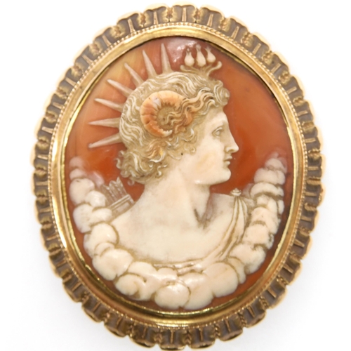 833 - A CLASSICAL CAMEO CLASP BROOCHcraftsman carved as a horned deity possibly Faunus/Pan, in a yellow me... 