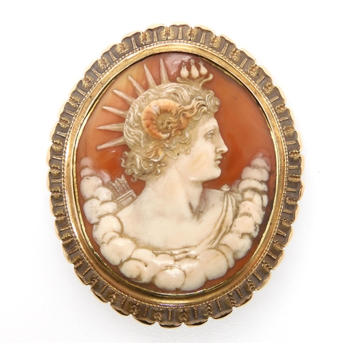 833 - A CLASSICAL CAMEO CLASP BROOCHcraftsman carved as a horned deity possibly Faunus/Pan, in a yellow me... 