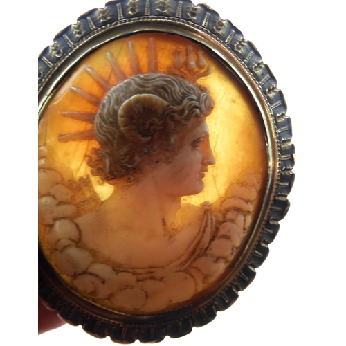 833 - A CLASSICAL CAMEO CLASP BROOCHcraftsman carved as a horned deity possibly Faunus/Pan, in a yellow me... 