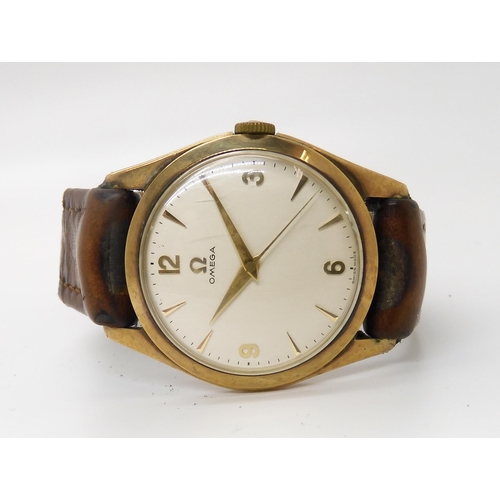 873 - A 9CT GOLD GENTS VINTAGE OMEGAwith silvered dial gold coloured chevron and arabic numerals, gold col... 