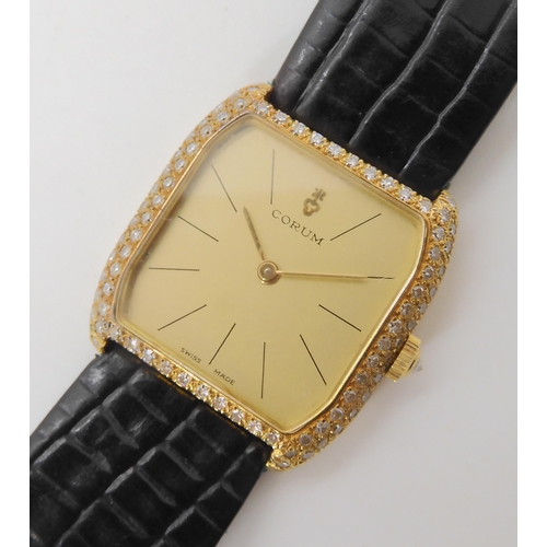 876 - AN 18K GOLD LADIES DIAMOND SET CORUM WRISTWATCHwith gold coloured Corum logo dial, and gold coloured... 