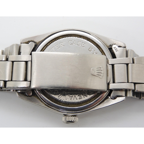 880 - A TUDOR OYSTER WRISTWATCHwith a stainless steel body and strap, the silvered dial has chevron and ba... 