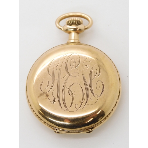 883 - A 14K GOLD LADIES WALTHAM FOB WATCHa white enamelled dial with black and red Arabic numerals, a subs... 