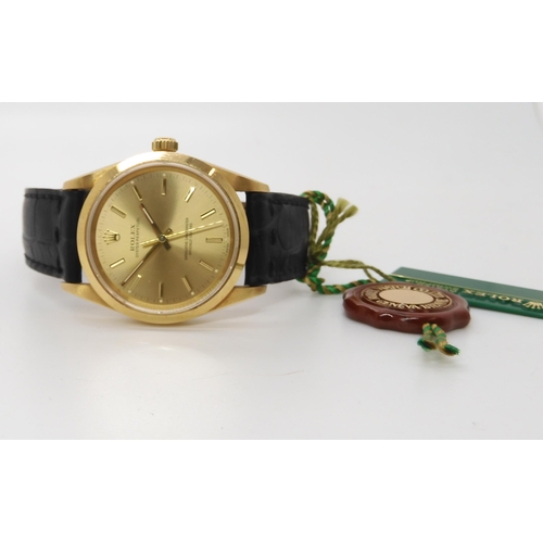 892 - AN 18CT GOLD GENTS ROLEX OYSTER PERPETUAL with gold coloured dial, baton numerals and hands. back th... 