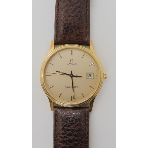 900 - A 9CT GOLD OMEGA SEAMASTER QUARTZ WATCH with silvered dial gold coloured baton numerals and hands, a... 