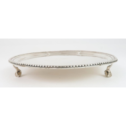 907 - AN 18TH CENTURY SILVER CARD TRAY by Robert Jones & John Scofield, London 1777, of circular form ... 