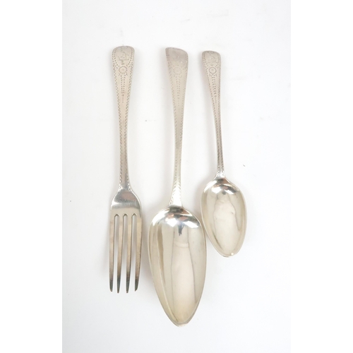 912 - A PART SUITE OF BRIGHT CUT SILVER CUTLERY by Thomas Wallis II, London 1810, comprising six tablespoo... 