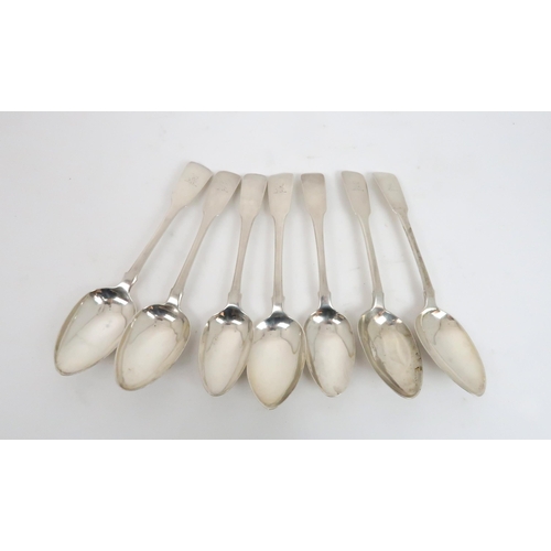 913 - A MIXED LOT OF SILVER CUTLERY comprising fifteen dessert spoons, two dessert forks & two teaspoo... 