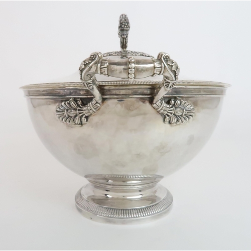 919 - A FRENCH 950 STANDARD SILVER SOUP TUREENof circular form, the domed cover with ornate scrolling hand... 