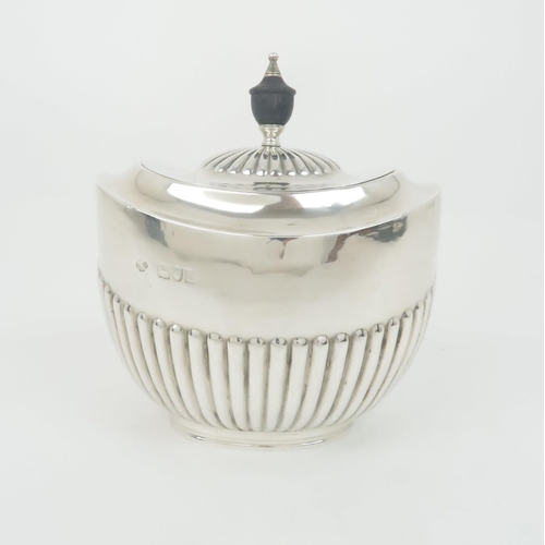 927 - A SILVER TEA CADDYunclear maker's marks London 1901 of oval form with hinged cover and half ribbed b... 