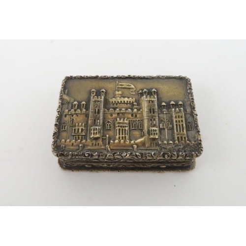 935 - A SILVER-GILT CASTLE TOP VINAIGRETTEby Nathanial Mills depicting Windsor Castle with gilt interior a... 