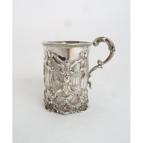 942 - A VICTORIAN SILVER CHRISTENING MUG London 1847, indistinct makers mark, decorated with figures of gi... 