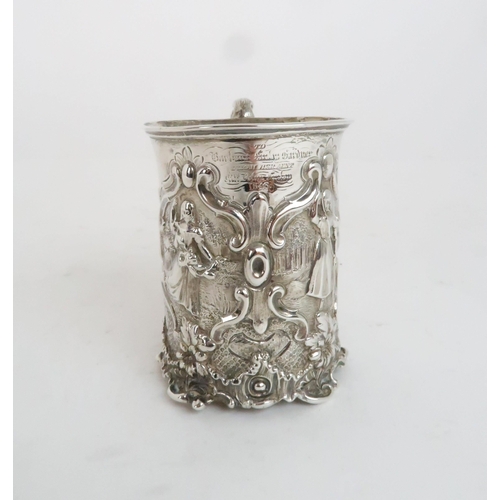 942 - A VICTORIAN SILVER CHRISTENING MUG London 1847, indistinct makers mark, decorated with figures of gi... 