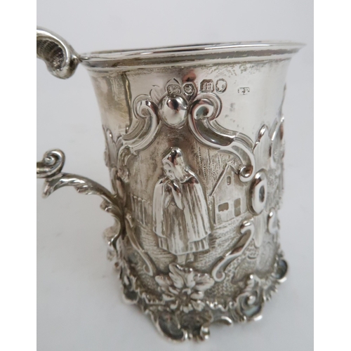 942 - A VICTORIAN SILVER CHRISTENING MUG London 1847, indistinct makers mark, decorated with figures of gi... 