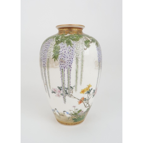 203 - A SATSUMA OVIFORM VASE by Kinkozan, painted with wisteria, hanging from a formal border and above bi... 