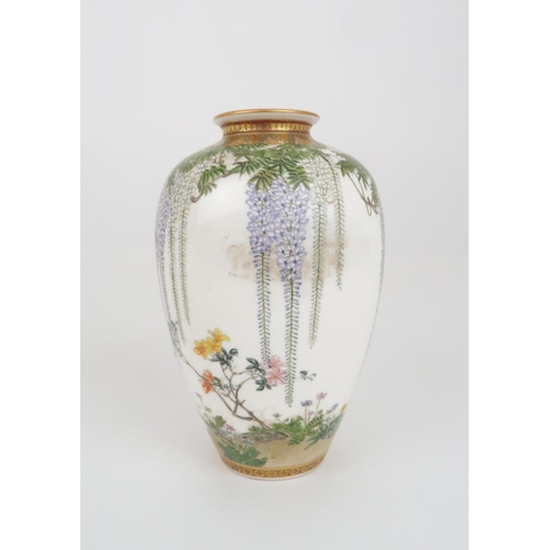 203 - A SATSUMA OVIFORM VASE by Kinkozan, painted with wisteria, hanging from a formal border and above bi... 