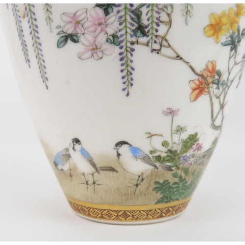 203 - A SATSUMA OVIFORM VASE by Kinkozan, painted with wisteria, hanging from a formal border and above bi... 