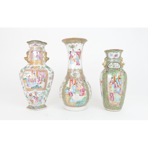 205 - THREE CANTONESE FAMILLE ROSE VASES a baluster vase with panelled figures, 30cm high, flattened balus... 