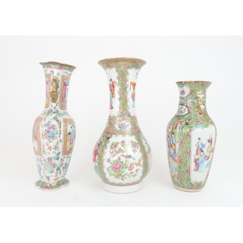 205 - THREE CANTONESE FAMILLE ROSE VASES a baluster vase with panelled figures, 30cm high, flattened balus... 