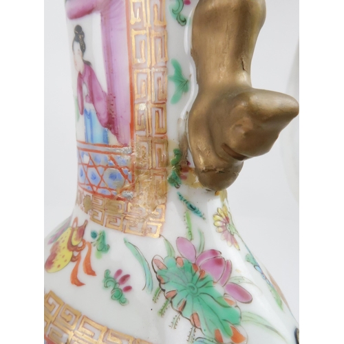 205 - THREE CANTONESE FAMILLE ROSE VASES a baluster vase with panelled figures, 30cm high, flattened balus... 