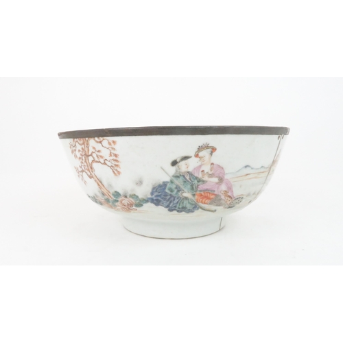 213 - A CHINESE EXPORT EUROPEAN SUBJECT PUNCH BOWLthe interior painted with fish and fronds,the exterior w... 