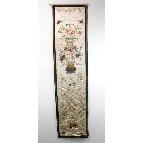 223 - FIVE CHINESE SILK EMBROIDERIEScomprising;a cream ground panel with a vase of flowers and precious ob... 