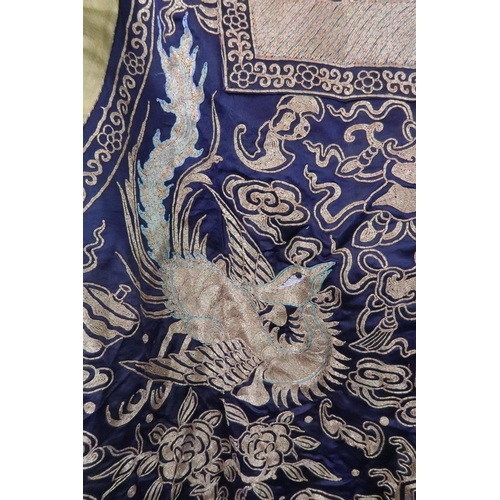 225 - A CHINESE SILK AND METAL THREAD JACKET(XIAPEI)woven with gilt metal threads of dragons chasing flami... 