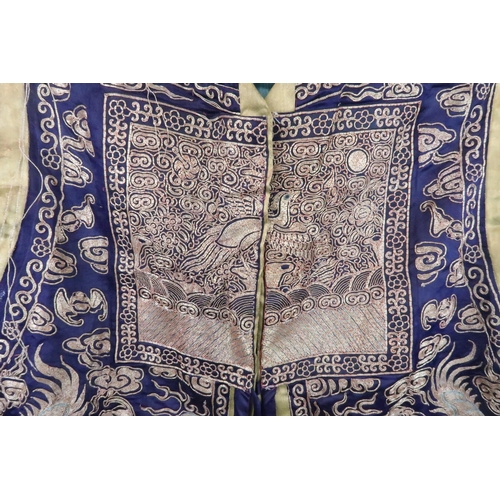 225 - A CHINESE SILK AND METAL THREAD JACKET(XIAPEI)woven with gilt metal threads of dragons chasing flami... 