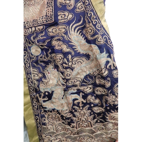 225 - A CHINESE SILK AND METAL THREAD JACKET(XIAPEI)woven with gilt metal threads of dragons chasing flami... 