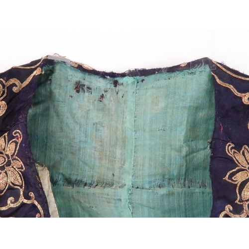 225 - A CHINESE SILK AND METAL THREAD JACKET(XIAPEI)woven with gilt metal threads of dragons chasing flami... 