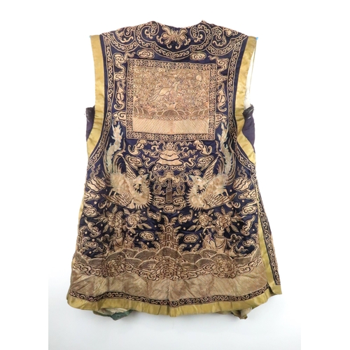 225 - A CHINESE SILK AND METAL THREAD JACKET(XIAPEI)woven with gilt metal threads of dragons chasing flami... 