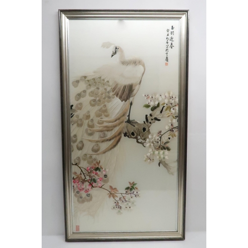 226 - A CHINESE SILK PANELdecorated with a peacock amongst flowering branches, signed, 125 x 62cm... 