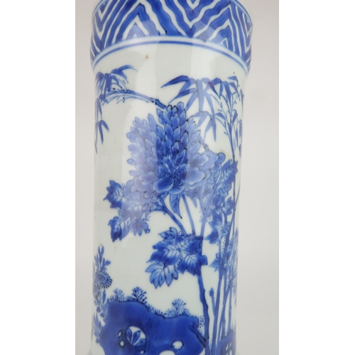 231 - A CHINESE TRANSITIONAL STYLE BLUE AND WHITE VASEpainted with birds amongst bamboo, peonies and chrys... 