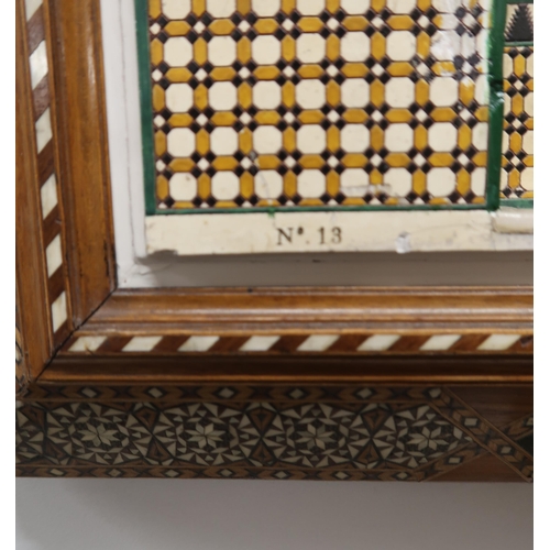 262 - A MARBLE AND PAINTED GESSO ALHAMBRA PLAQUEpolychrome and gilt within an inlaid frame, signed, Enriqu... 