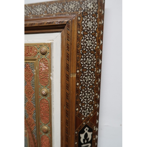 263 - A MARBLE AND PAINTED GESSO ALHAMBRA PLAQUEpolychrome and gilt, within inlaid frame, the panel, 47 x ... 