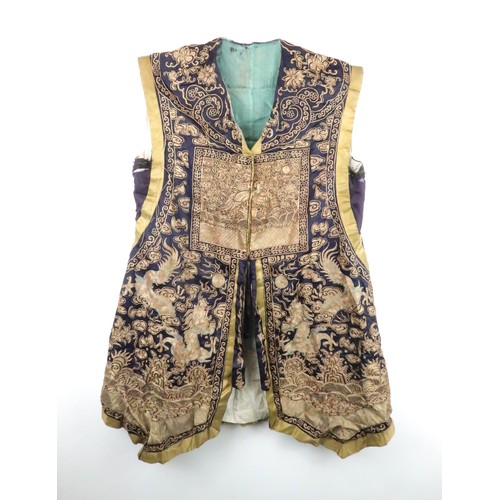 225 - A CHINESE SILK AND METAL THREAD JACKET(XIAPEI)woven with gilt metal threads of dragons chasing flami... 