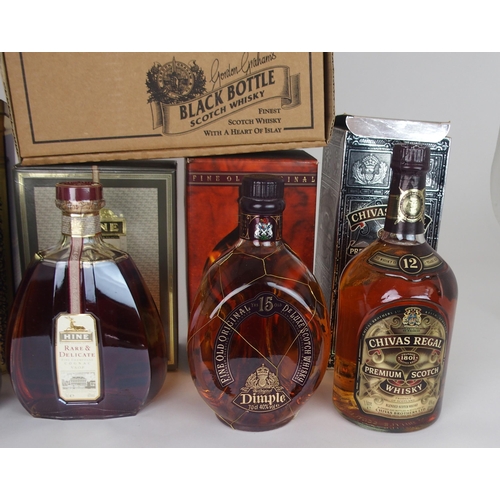 609 - A BOTTLE OF PINWINNIE DELUXE WHISKYin tin box, 40%vol, 70cl, Chivas Regal 12 year old, Dimple, six B... 