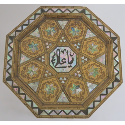 5A - AN EARLY 20TH CENTURY OCTAGONAL TOP MOORISH SEWING TABLE,with fruit wood and mother of pearl inlays ... 