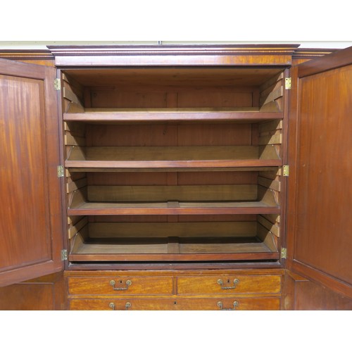 17A - A VICTORIAN MAHOGANY BREAKFRONT COMPACTUM, with central two door linen press above two short over th... 