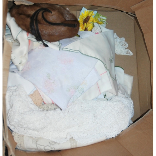 229 - A blonde mink jacket, a pale brown fur coat and assorted table linen...