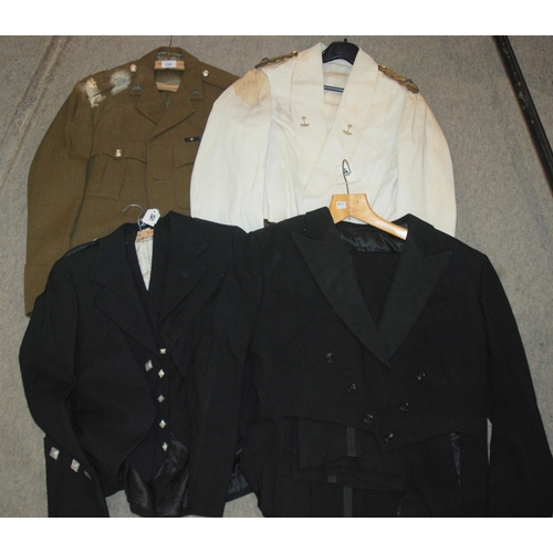 233 - Assorted military jackets and trousers...
